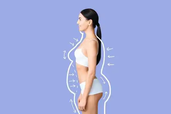 image of woman experiencing fat reduction treatment Stratford-upon-Avon