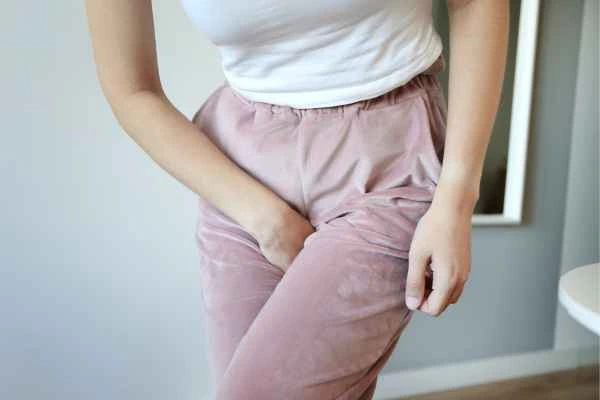 older woman running to the toilet because of urinary incontinence Stratford-upon-Avon